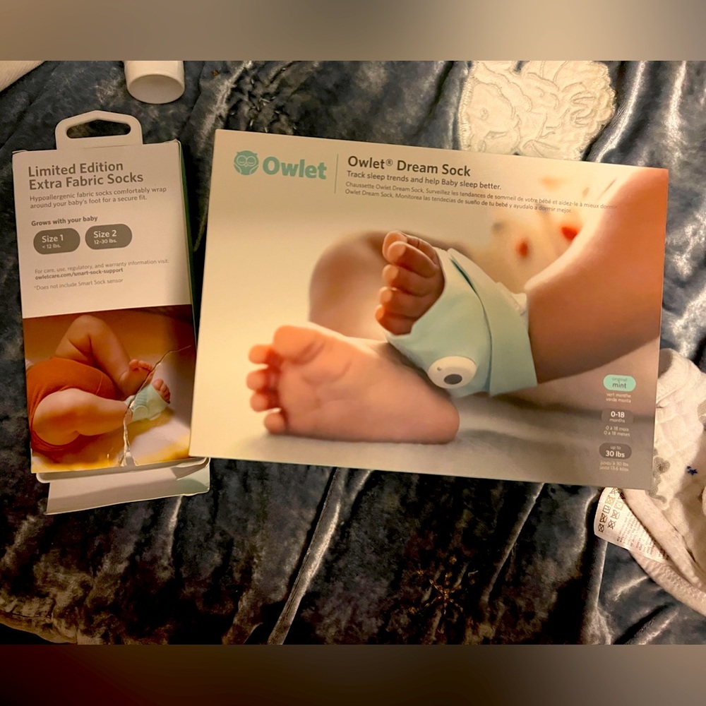 Owlet baby monitor with extra limited edition rainbow socks. New